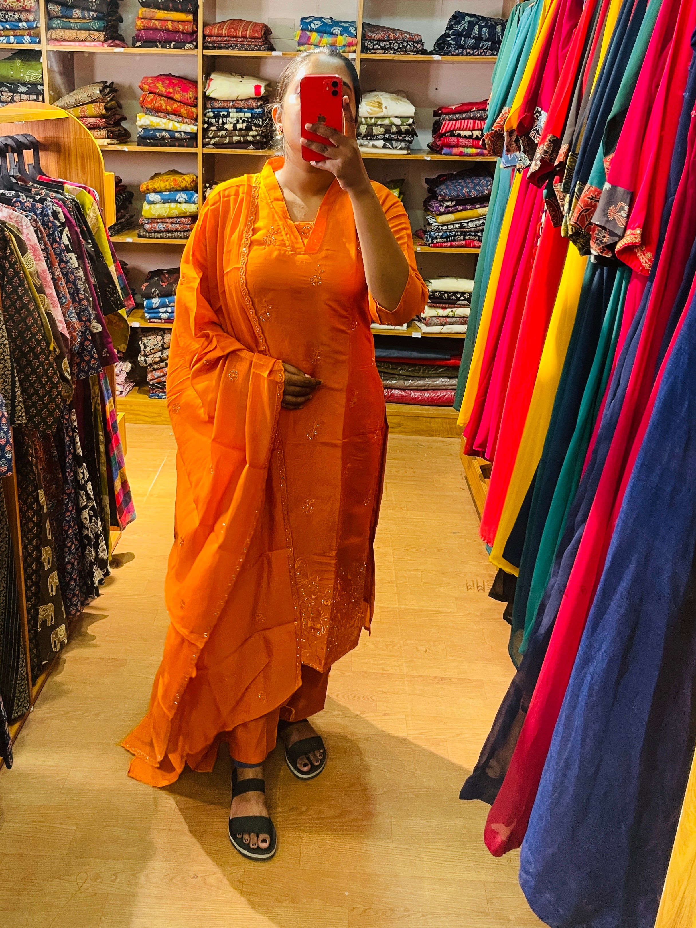 Pranavi orange embellished kurta set with sheer matching dupatta close-up