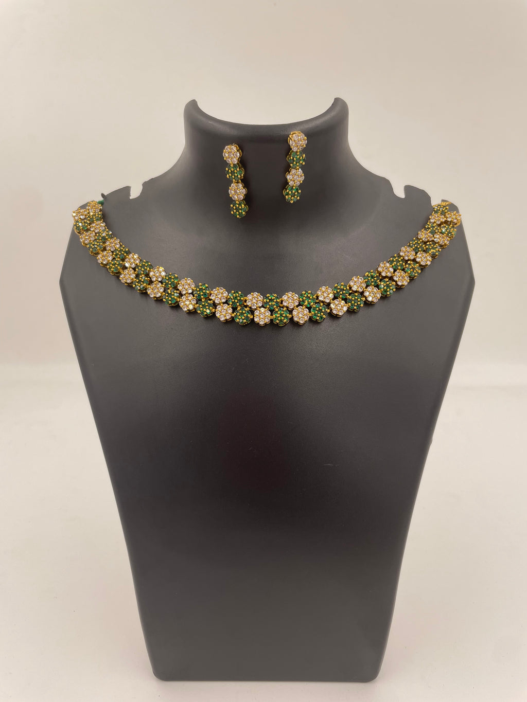 Diva Green Bloom necklace set with green and white AD stones and matching earrings