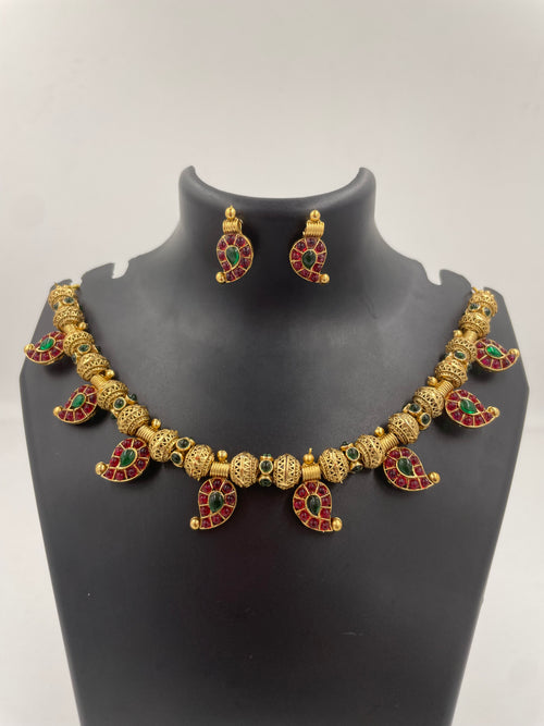 Aadhira gold micro plated mango mala necklace set with ruby-coloured and emerald-green semi-precious stones and matching earrings