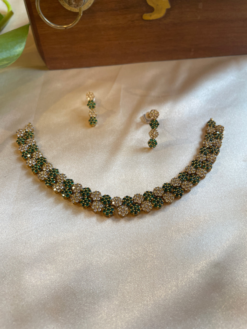 Diva Green Bloom necklace set with green and white AD stones and matching earrings