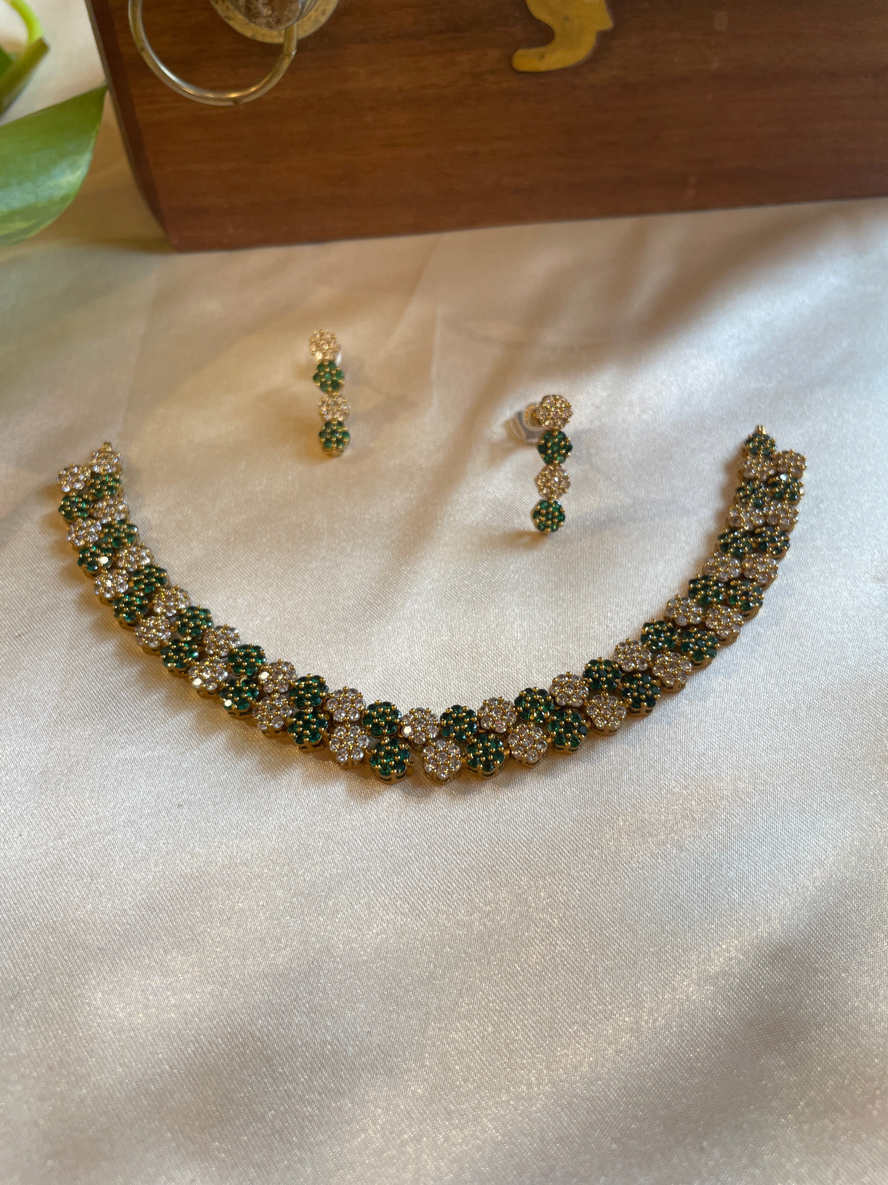 Diva Green Bloom necklace set with green and white AD stones and matching earrings